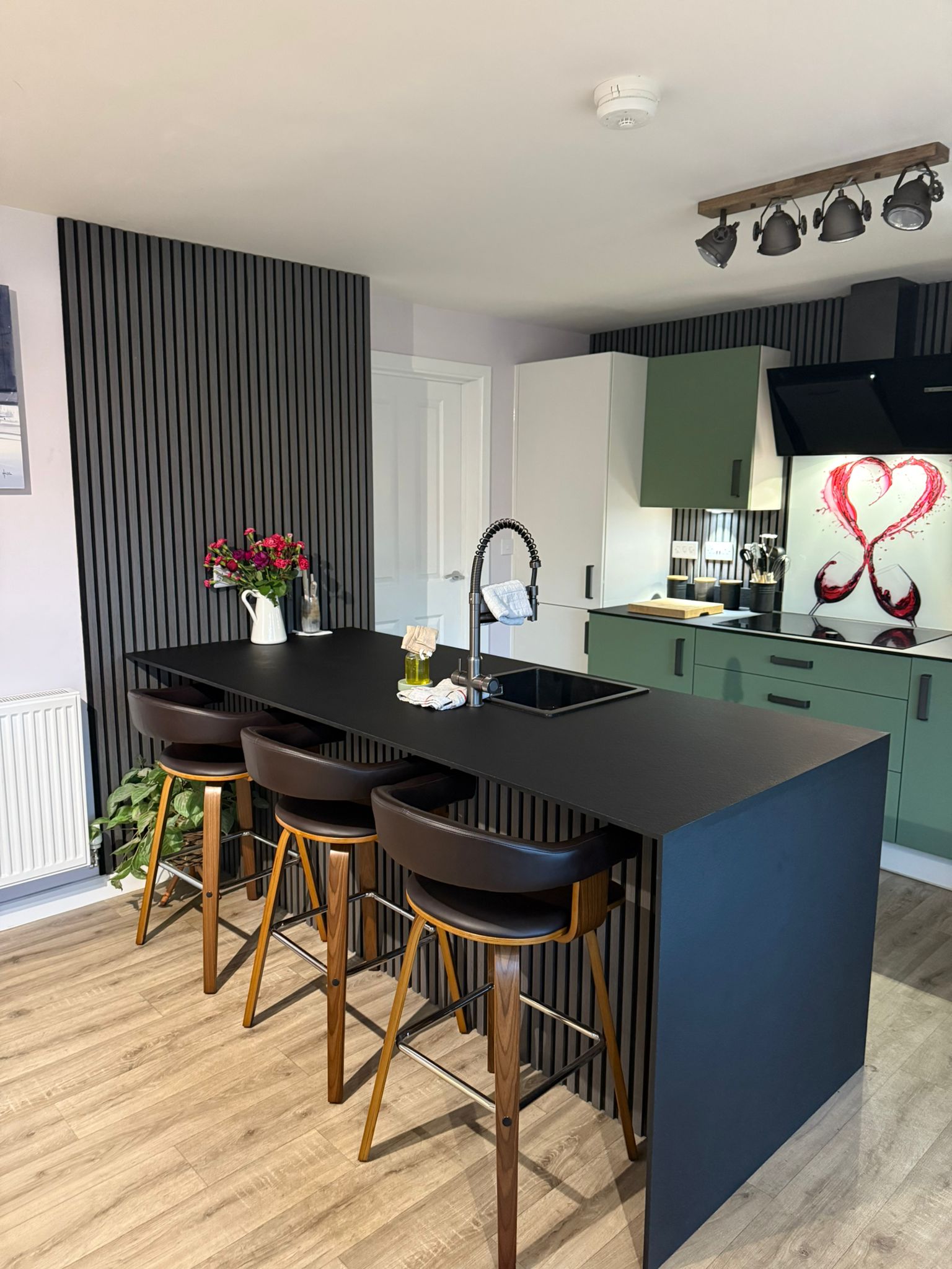 green-kitchen-island-slat-wall
